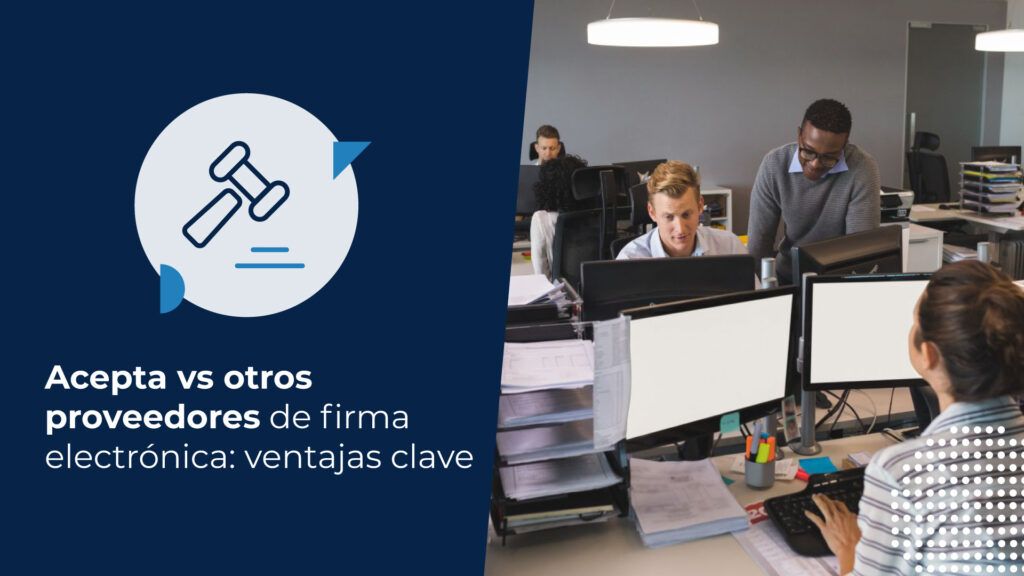 Equipo de profesionales colaborando en una oficina moderna frente a monitores, analizando soluciones de proveedores de firma electrónica para la digitalización de documentos.
